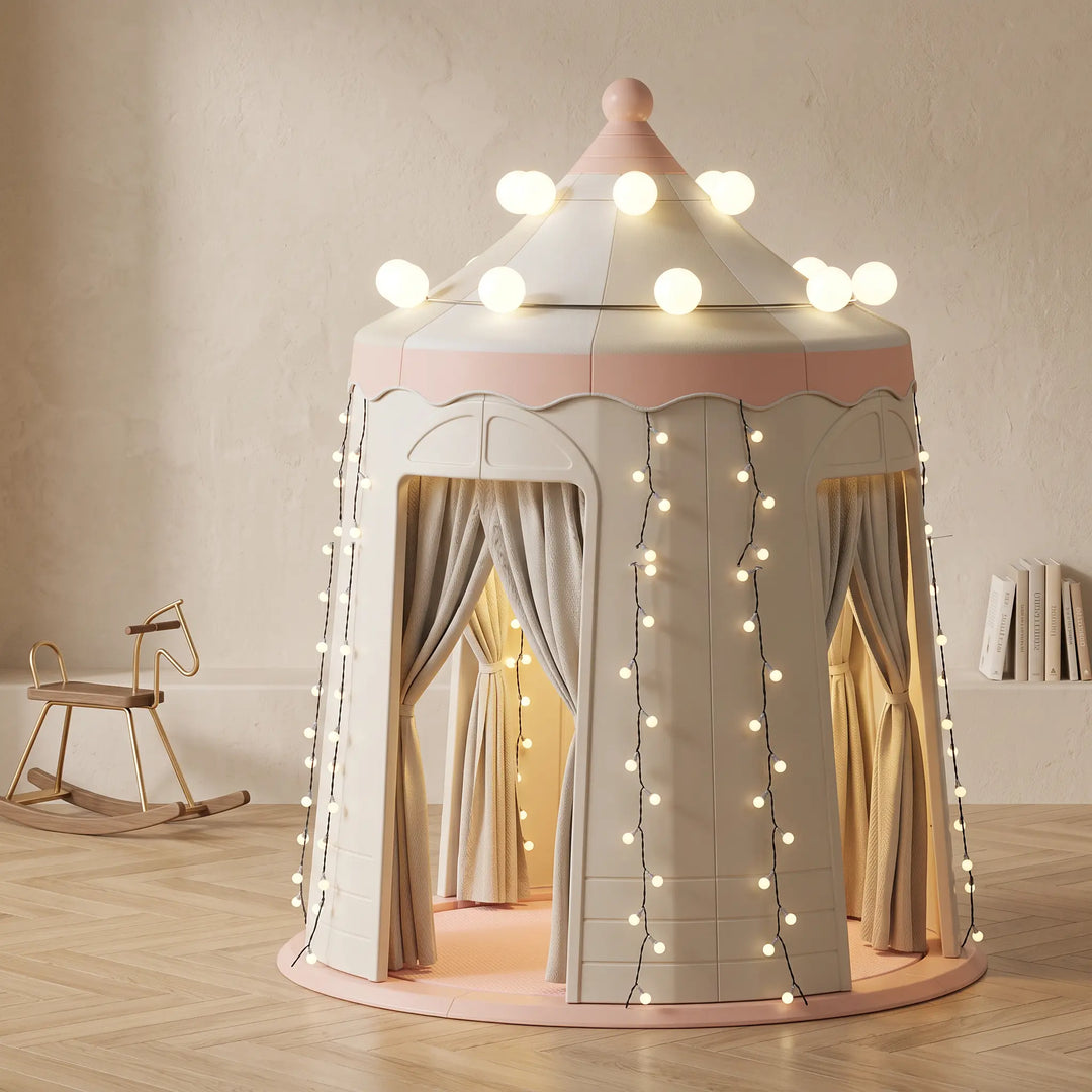 ToyHare pink and beige castle playhouse tent with integrated lights, draped curtains, and measurement indicators on a studio background.
