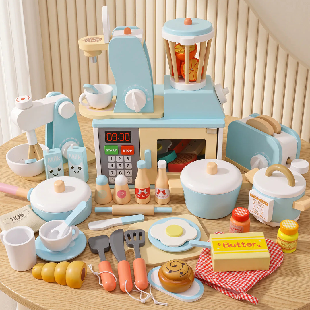 ToyHare wooden kitchen playset arranged with mixer, blender, oven, toaster, coffee maker, pots, pans, play food, and accessories on a light wooden surface.